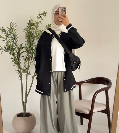 Amenaa Simple Snap Jacket in neutral fabric, featuring snap buttons and a relaxed fit, perfect for casual wear.