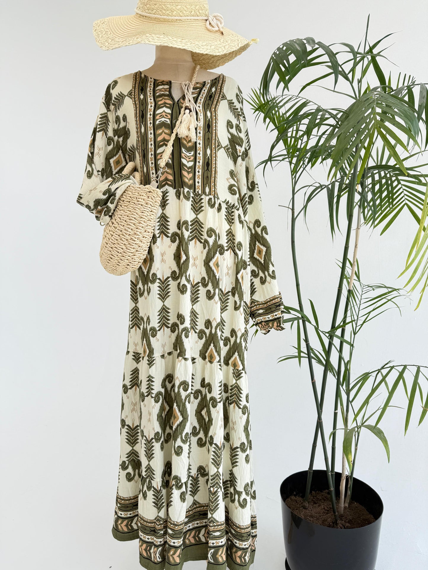 Amenaa boho pattern maxi dress with flowing fabric and vibrant designs, perfect for casual or summer wear.