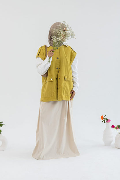 Amenaa new gabardine vest featuring a tailored fit and classic design, shown in a neutral color with front button closure.