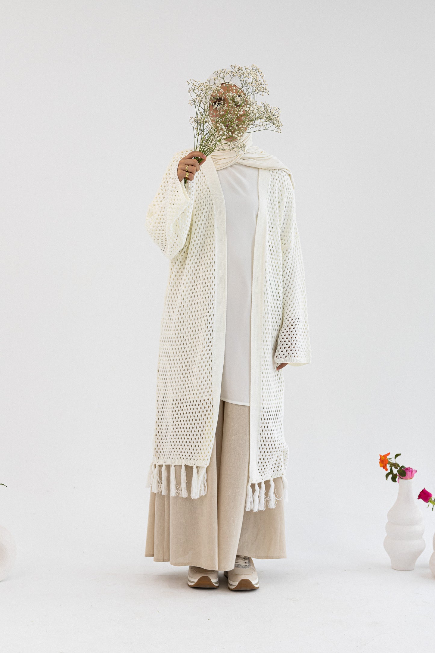 Amenaa crochet knit cardigan, 13/41/2 style, featuring a cozy, textured design in soft yarn, perfect for casual wear.
