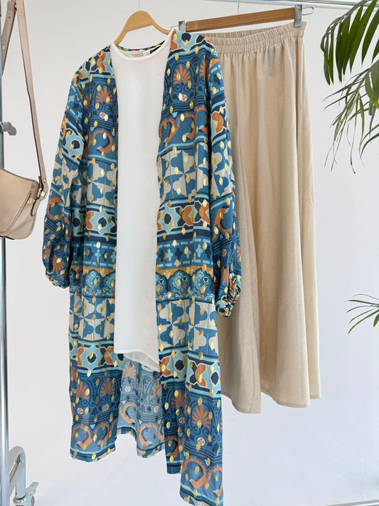 Amenaa mosaic pattern kimono with vibrant geometric design, flowing fabric, and traditional Japanese-inspired style.