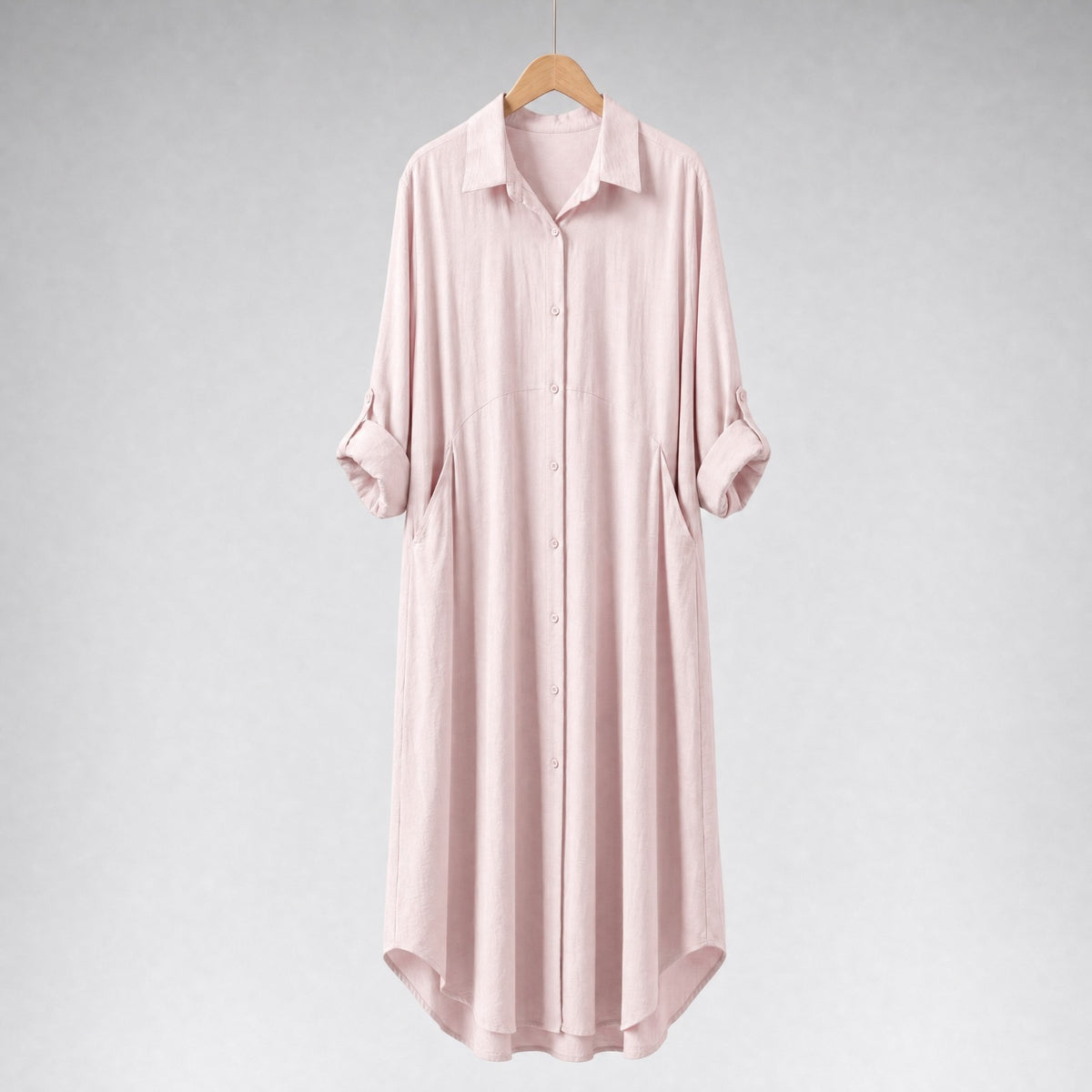 Amenaa shirt dress in lightweight fabric, featuring a button-down front, collar, and short sleeves, displayed on a hanger.