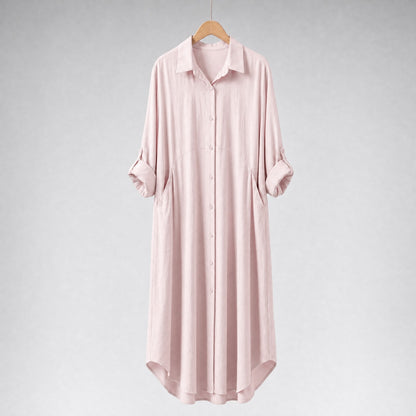 Amenaa shirt dress in lightweight fabric, featuring a button-down front, collar, and short sleeves, displayed on a hanger.