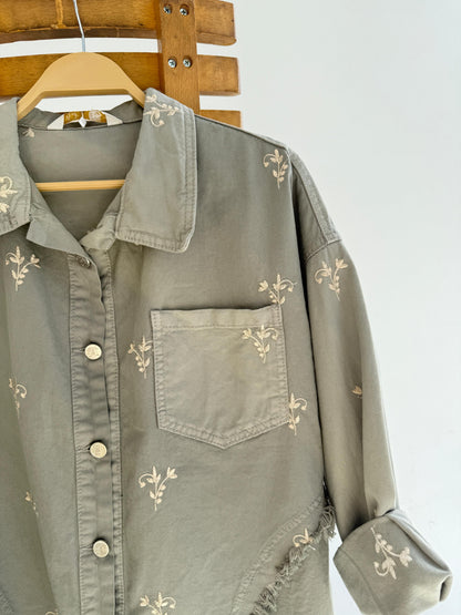 Amenaa flowery embroidered gabardine jacket with colorful floral patterns and tailored fit, shown on a model.