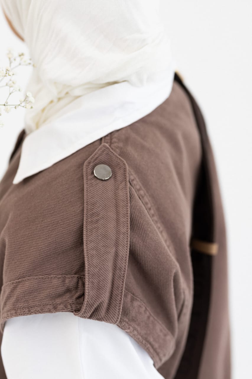 Amenaa gabardine vest in classic design, showcasing a tailored fit and durable fabric for a stylish layered look.