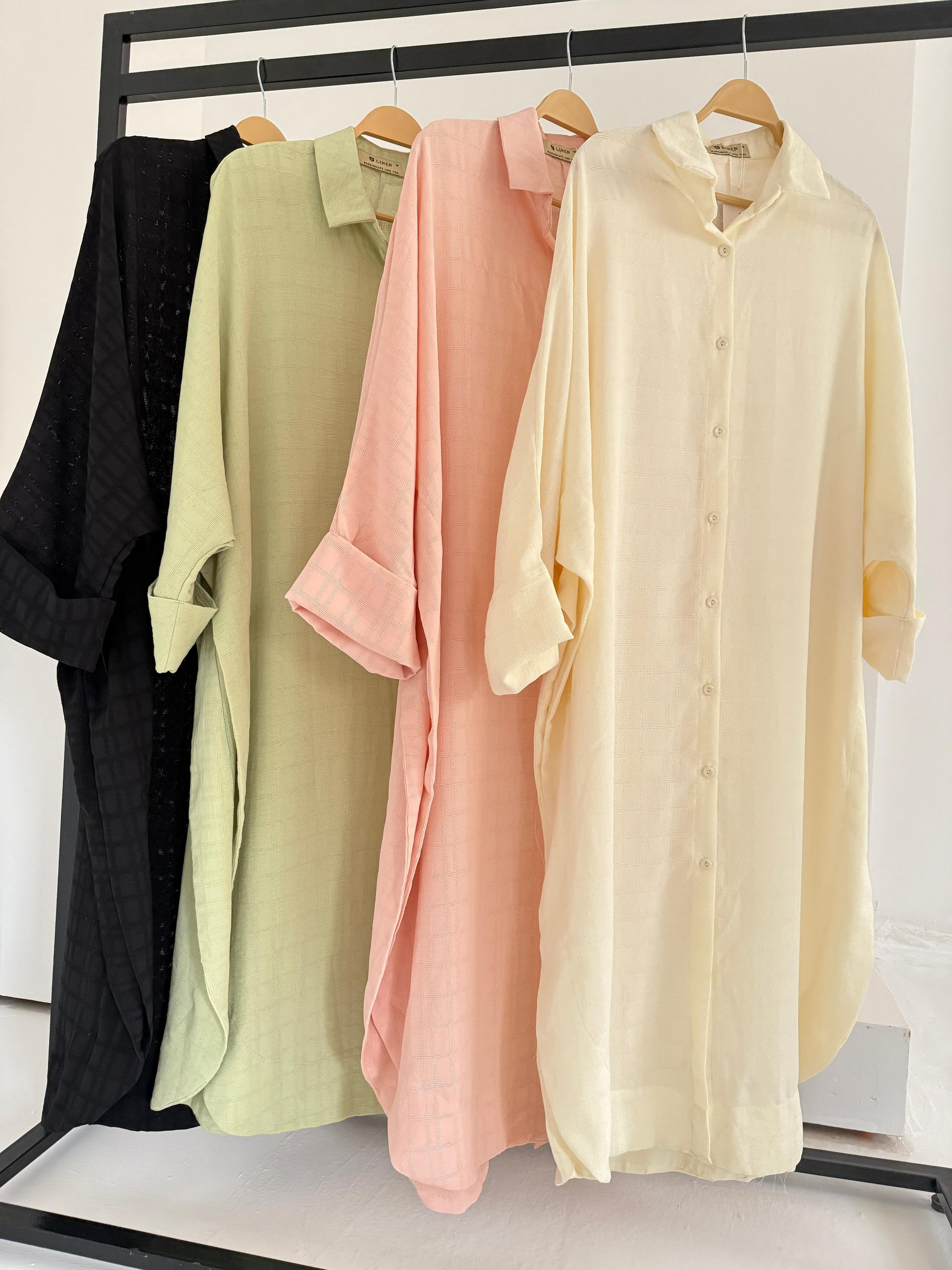 Textured oversized Amenaa shirt dress with long sleeves and a relaxed fit, displayed on a mannequin.
