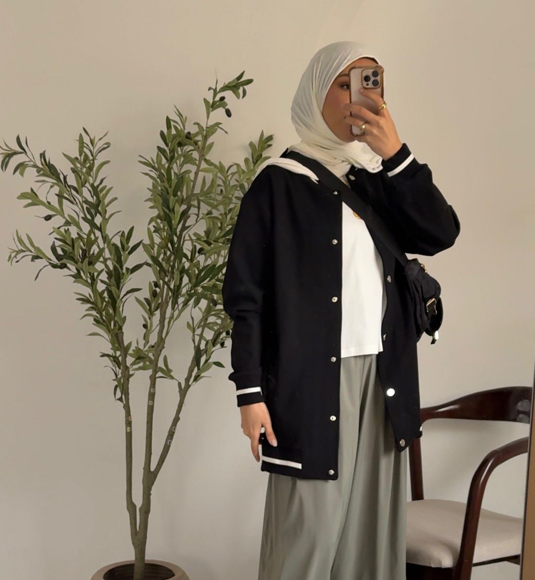 Amenaa Simple Snap Jacket in neutral fabric, featuring a clean design with snap closures and a modern, minimalist style.