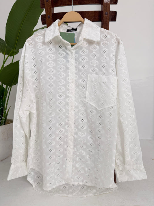 Amenaa embroidered shirt featuring intricate floral embroidery on soft fabric, displayed on a mannequin.