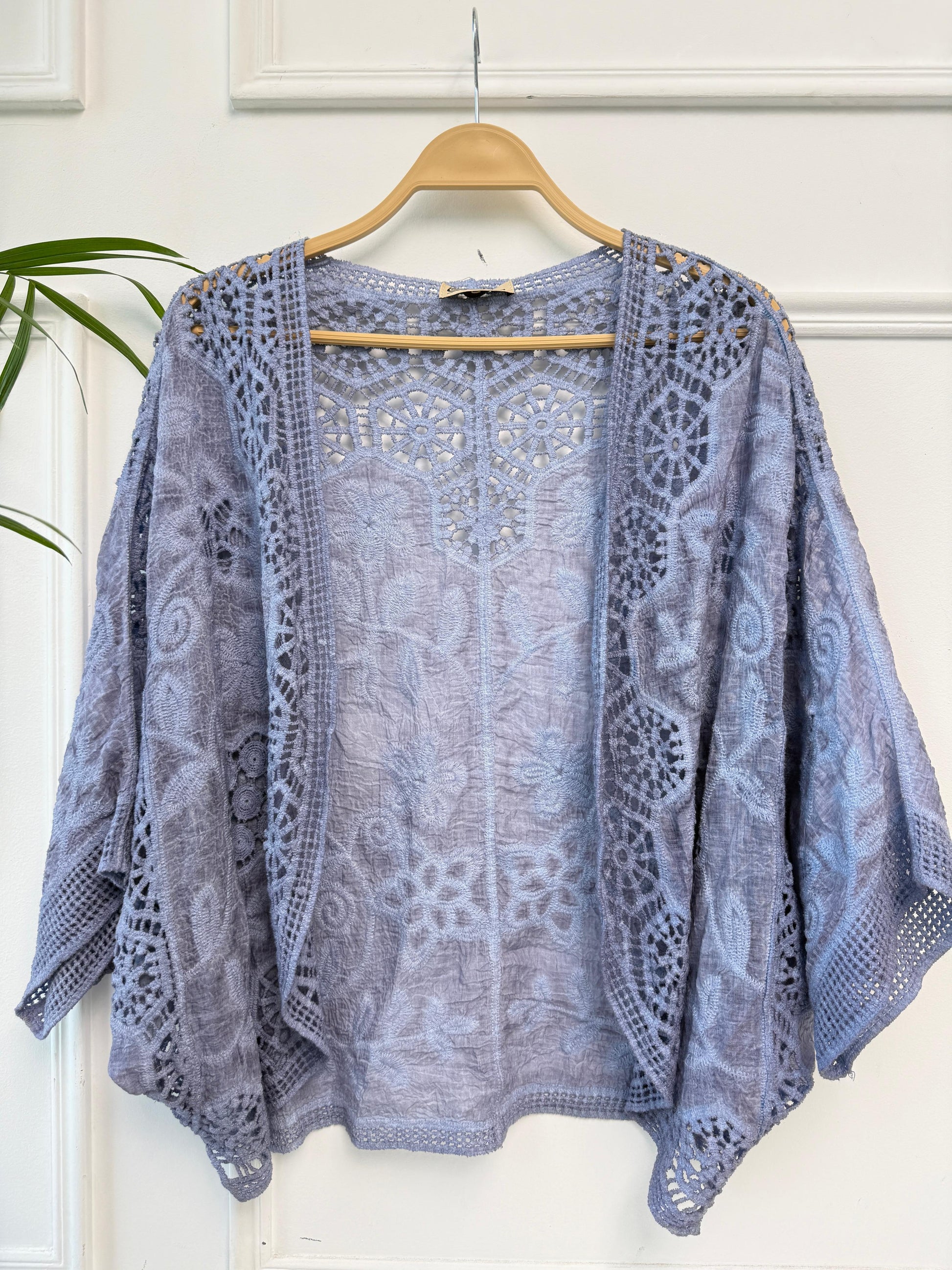 Boho crochet lace kimono by Amenaa featuring intricate lace patterns and lightweight fabric for a stylish layered look.
