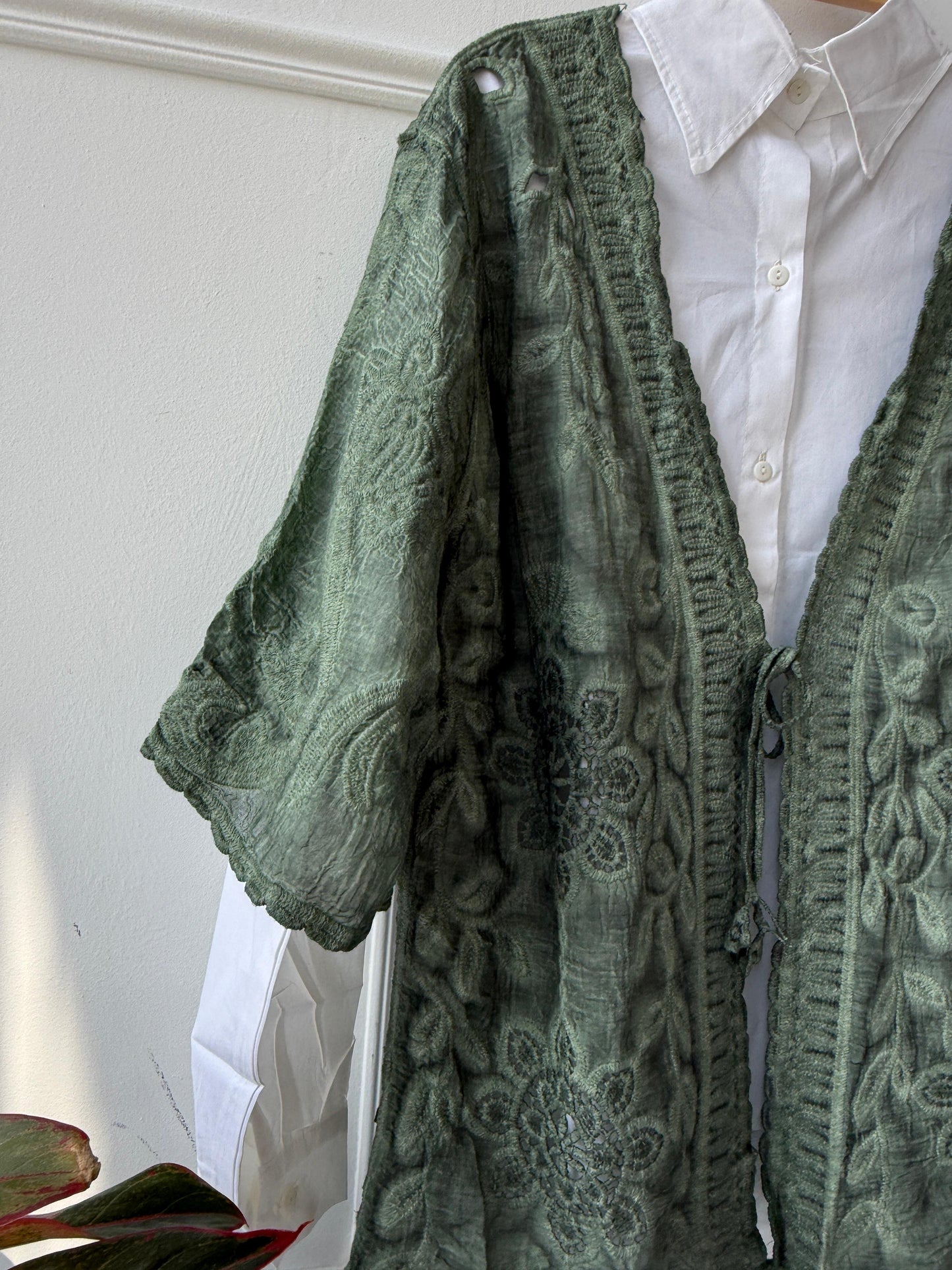 Embroidered lace kimono by Amenaa featuring intricate floral embroidery and lightweight, sheer fabric for elegant wear