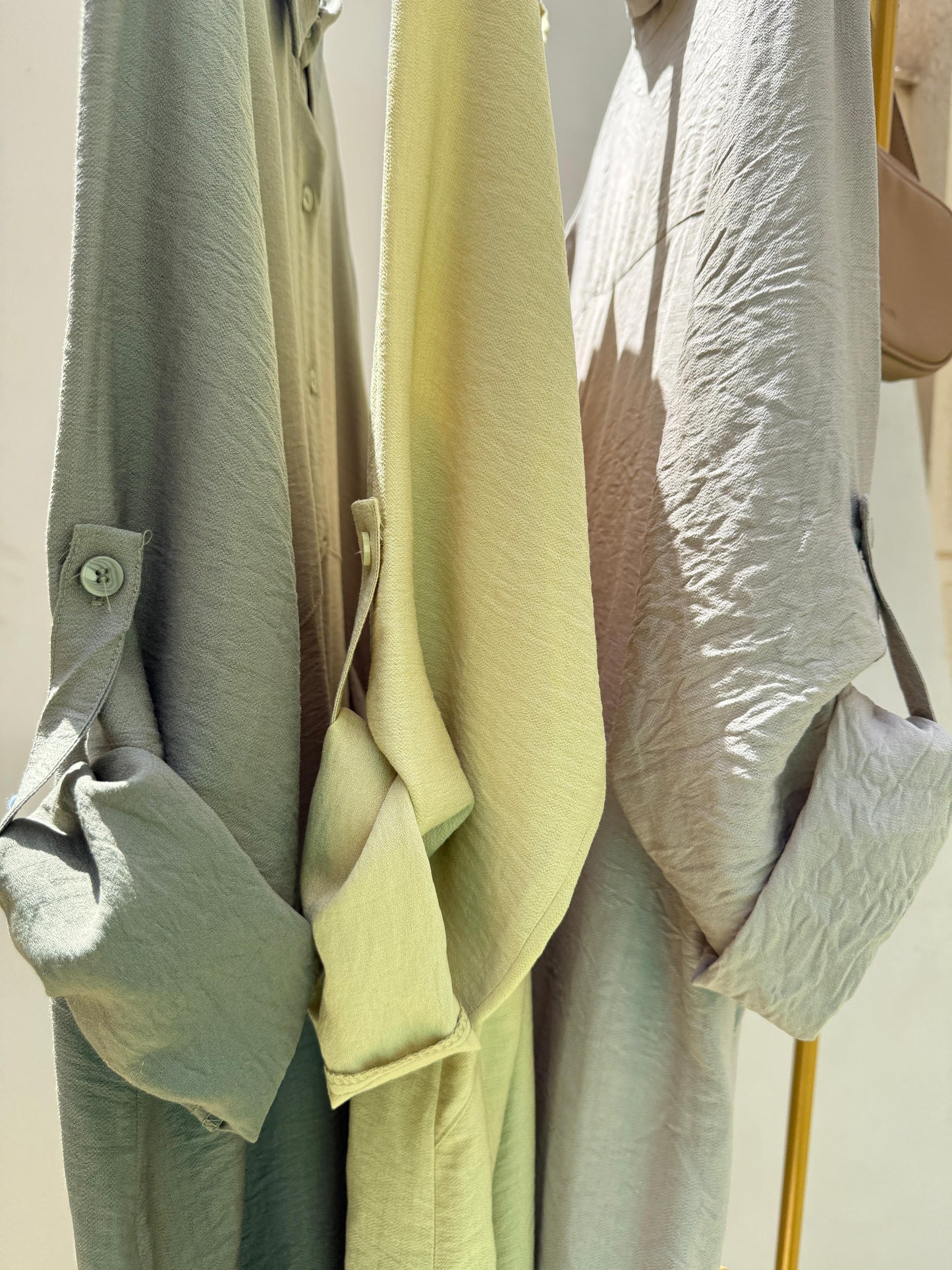 Amenaa shirt dress with short sleeves and a relaxed fit, displayed on a hanger against a plain background.