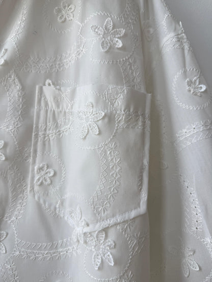 Amenaa floral embroidered shirt featuring colorful flower patterns on lightweight fabric, stylish and perfect for casual wear.