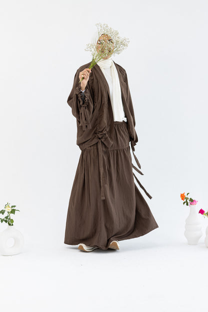 Amenaa flowy skirt set featuring a lightweight, layered skirt and matching top in soft, flowing fabric suitable for casual wear.