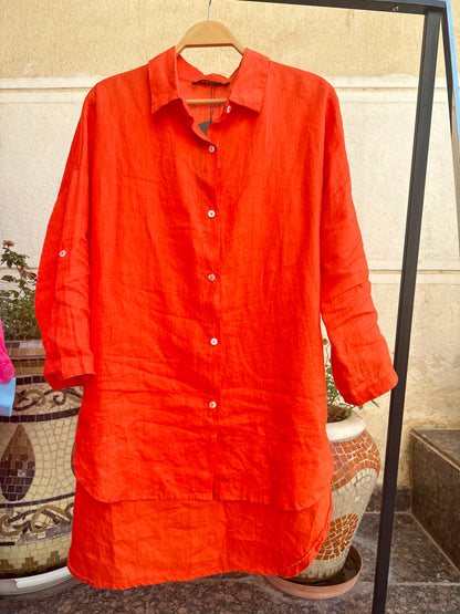 Light beige Amenaa linen shirt laid flat, showcasing its breathable, relaxed fit and natural fabric texture.