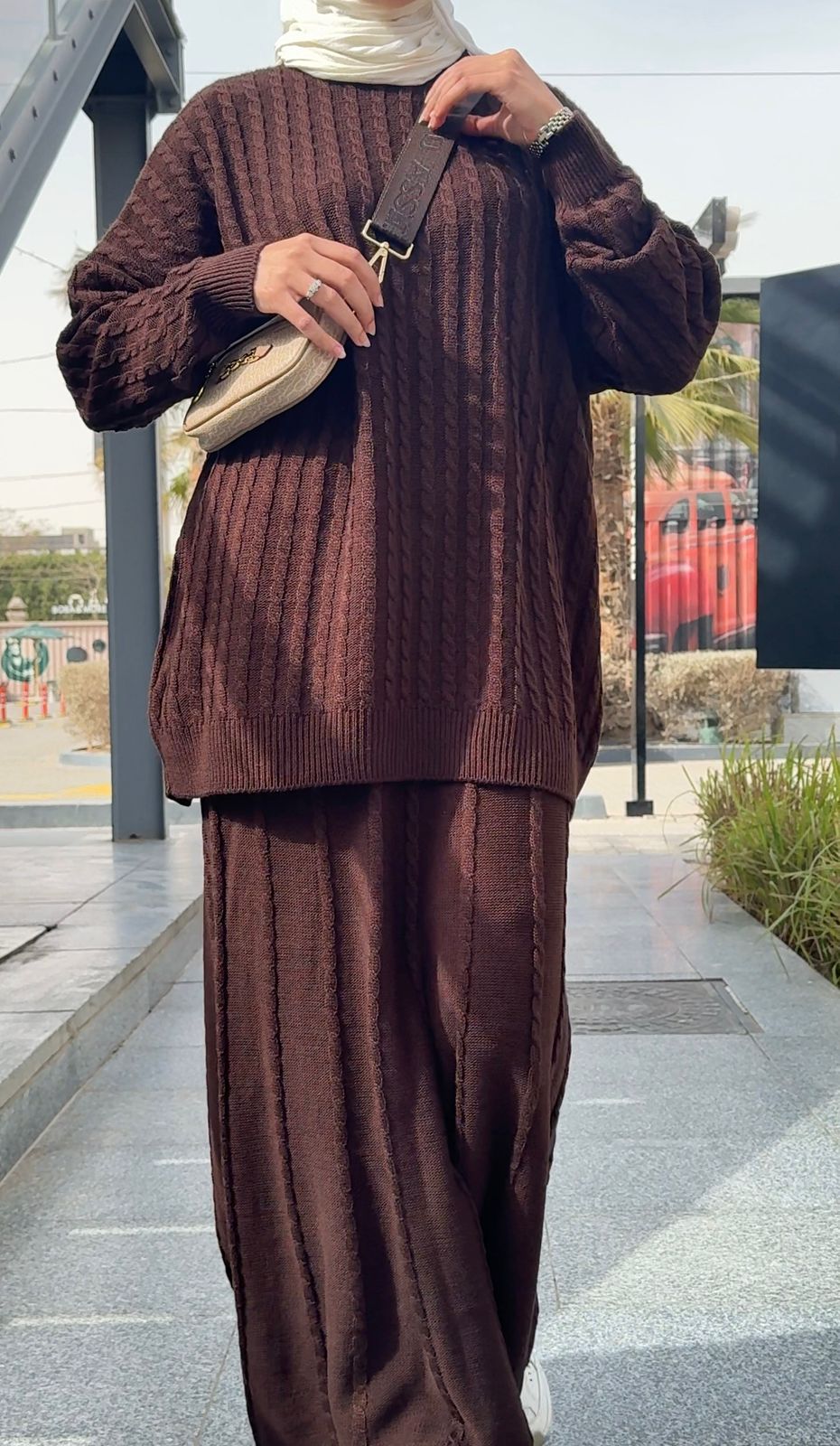 Amenaa knitted set featuring a cozy sweater and matching pants in soft yarn, perfect for casual wear.