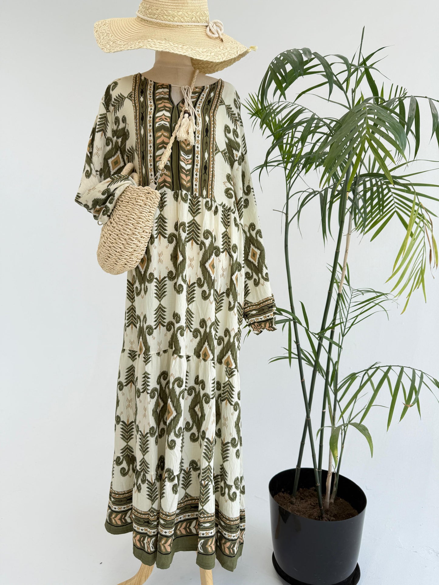 Amenaa boho pattern maxi dress with flowing fabric and vibrant design, perfect for casual summer wear.