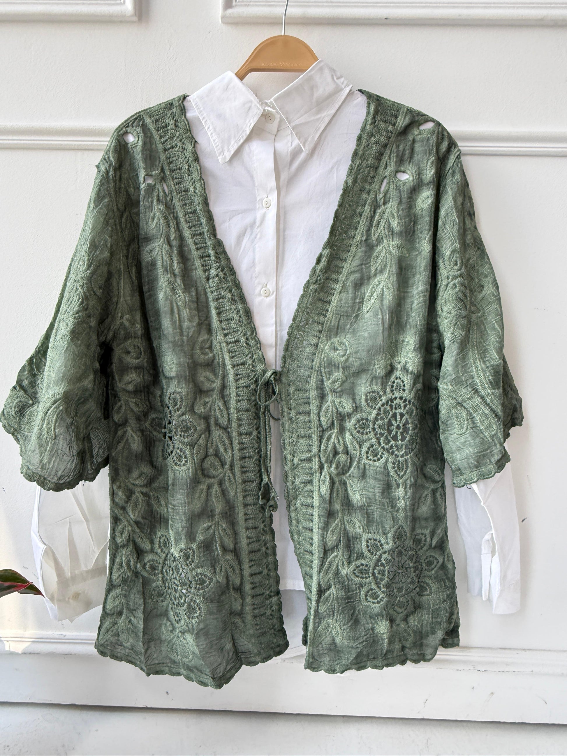 Embroidery lace kimono by Amenaa featuring delicate floral patterns and lightweight fabric, perfect for stylish layering.