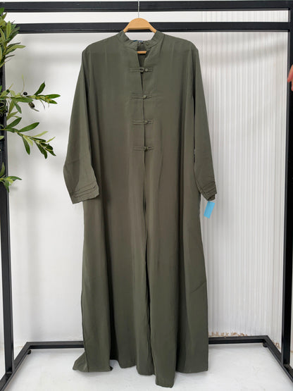 Amenaa modest Tencel dress displayed on a hanger, featuring a flowing, lightweight fabric and elegant, relaxed fit.