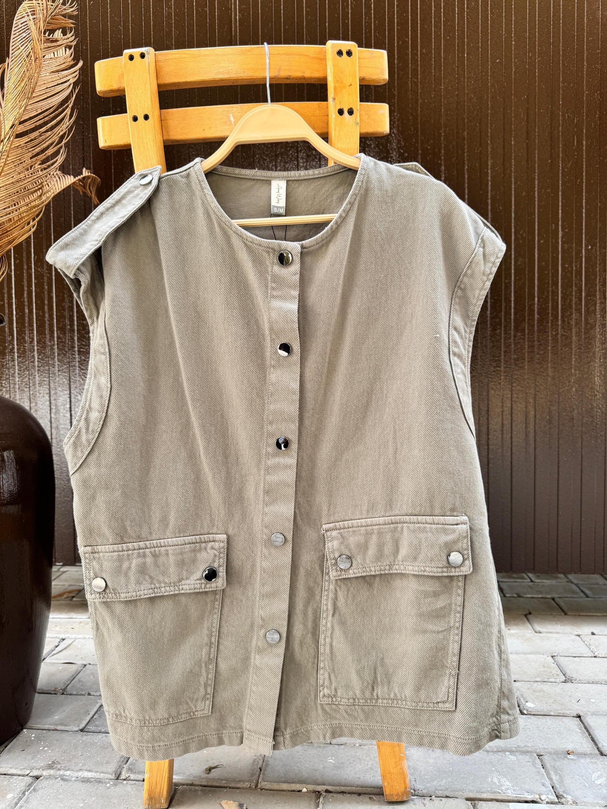 Amenaa new gabardine vest, stylish and tailored, shown in a close-up image highlighting the fabric and fit.