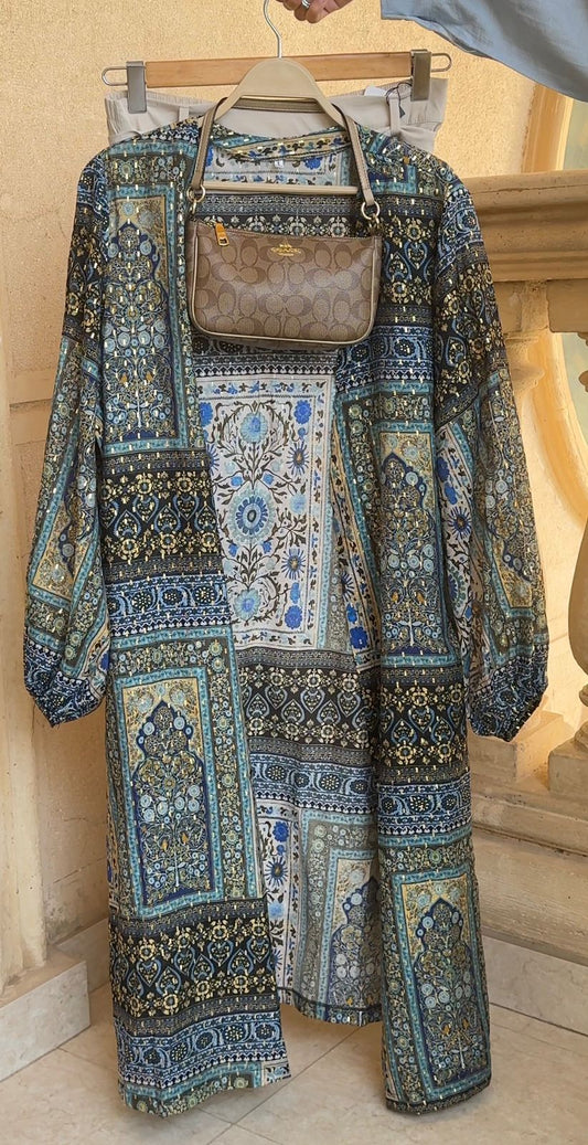 Amenaa geometric print kimono featuring bold, colorful patterns and flowing fabric, perfect for stylish layering and bohemian fashion.