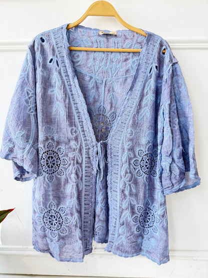 Embroidered lace kimono by Amenaa featuring delicate floral embroidery and lightweight, sheer fabric for a stylish layered look.