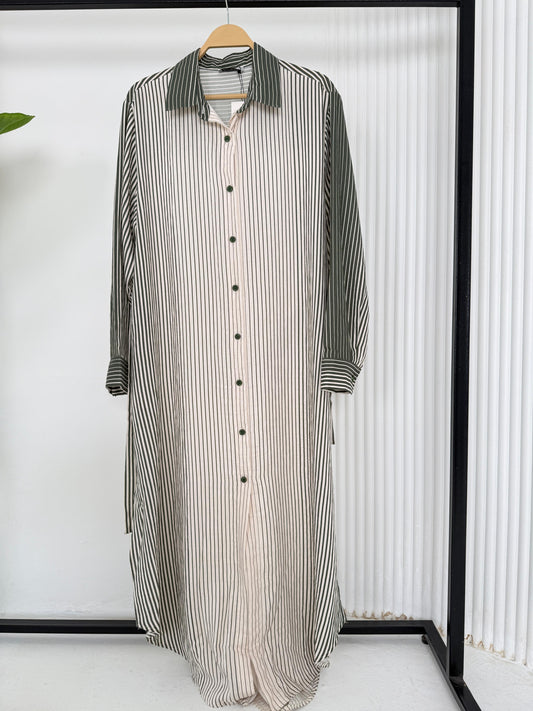 Amenaa long striped shirt, lightweight and casual, featuring vertical blue and white stripes and a relaxed fit.