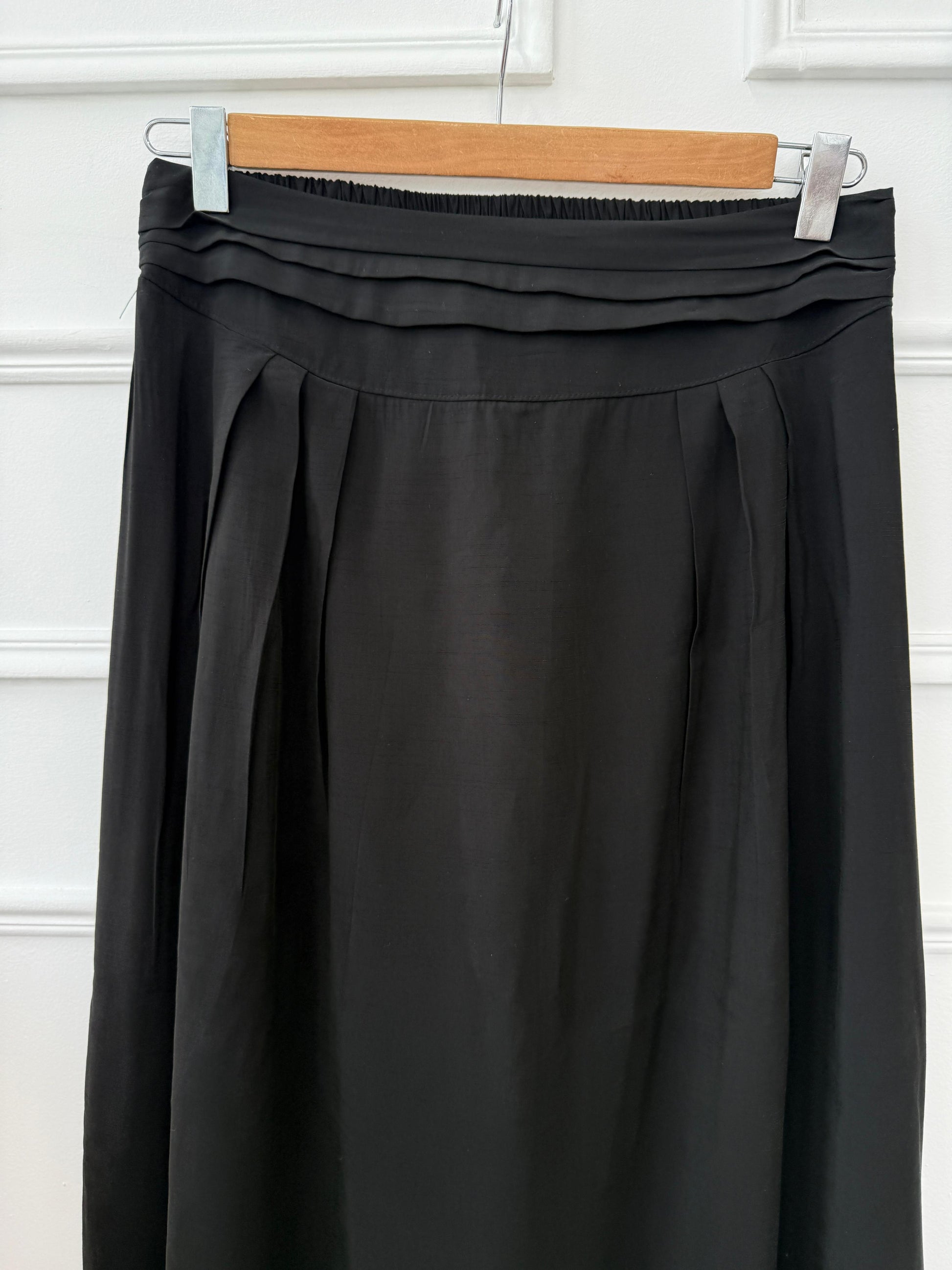 Amenaa new skirt featuring a stylish design, shown in a full-length image with fabric details and a flattering fit.