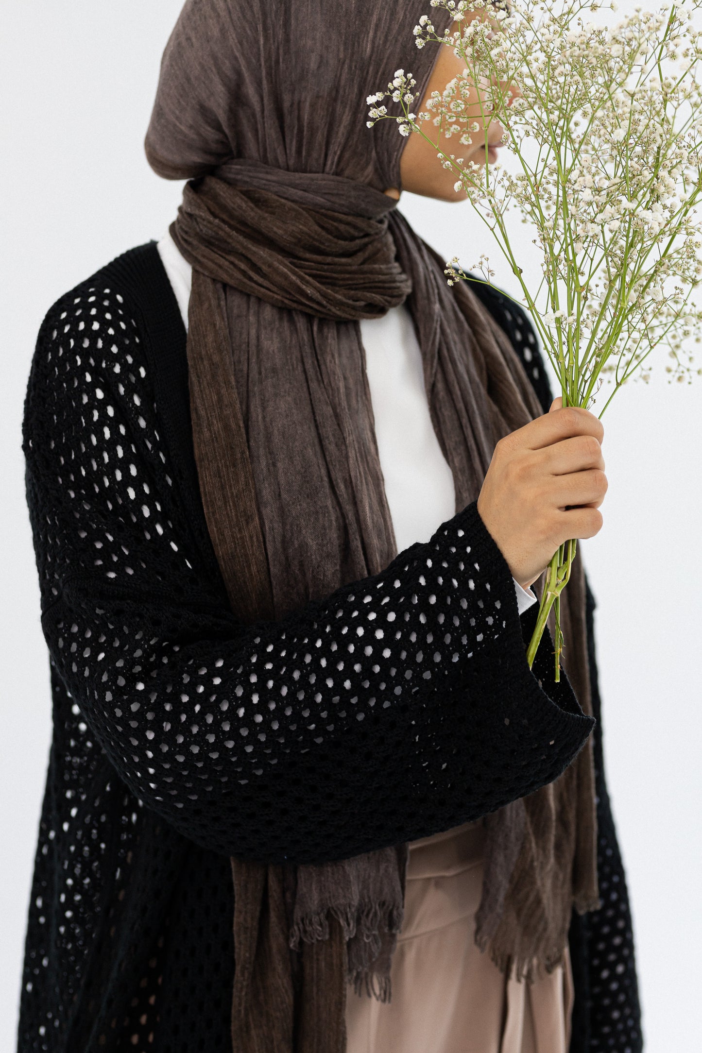 Amenaa crochet knit cardigan in a cozy, textured design, featuring long sleeves and an open front for a casual, stylish look.