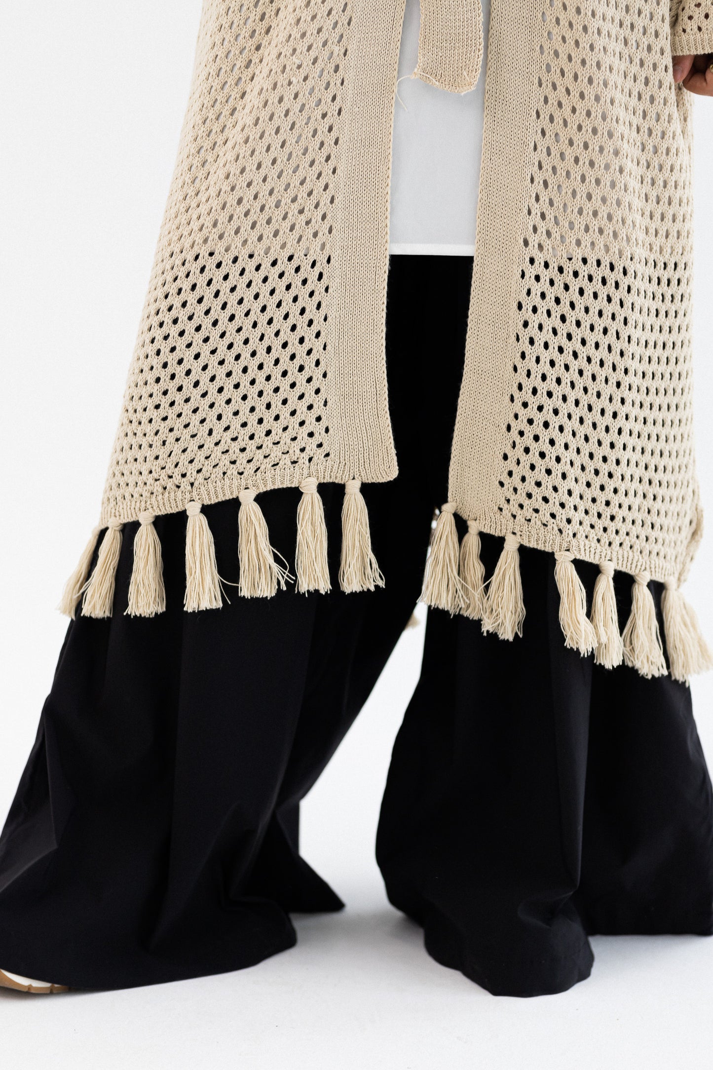 Amenaa crochet knit cardigan with long sleeves and open front, featuring a textured, cozy design perfect for casual wear.