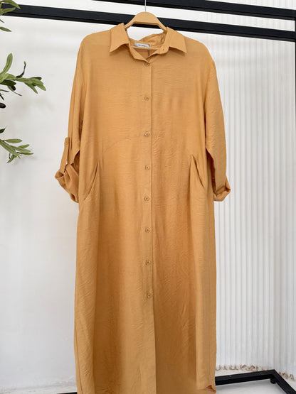 Amenaa shirt dress in lightweight fabric, featuring a relaxed fit and button-down front, perfect for casual or office wear.