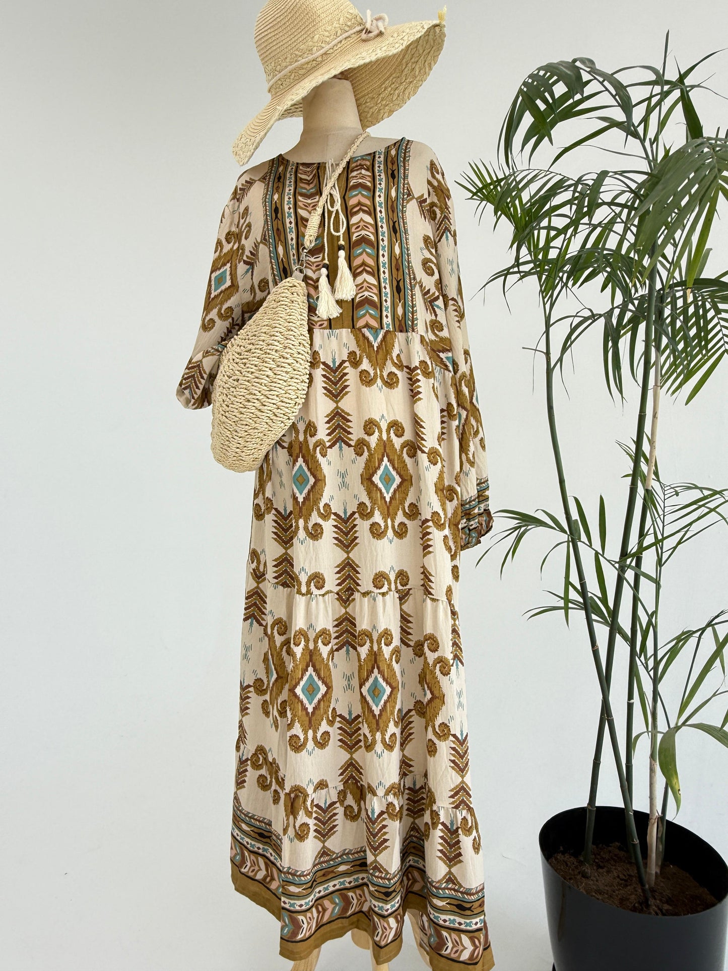 Amenaa boho pattern maxi dress with flowing fabric and vibrant design, perfect for casual summer wear.