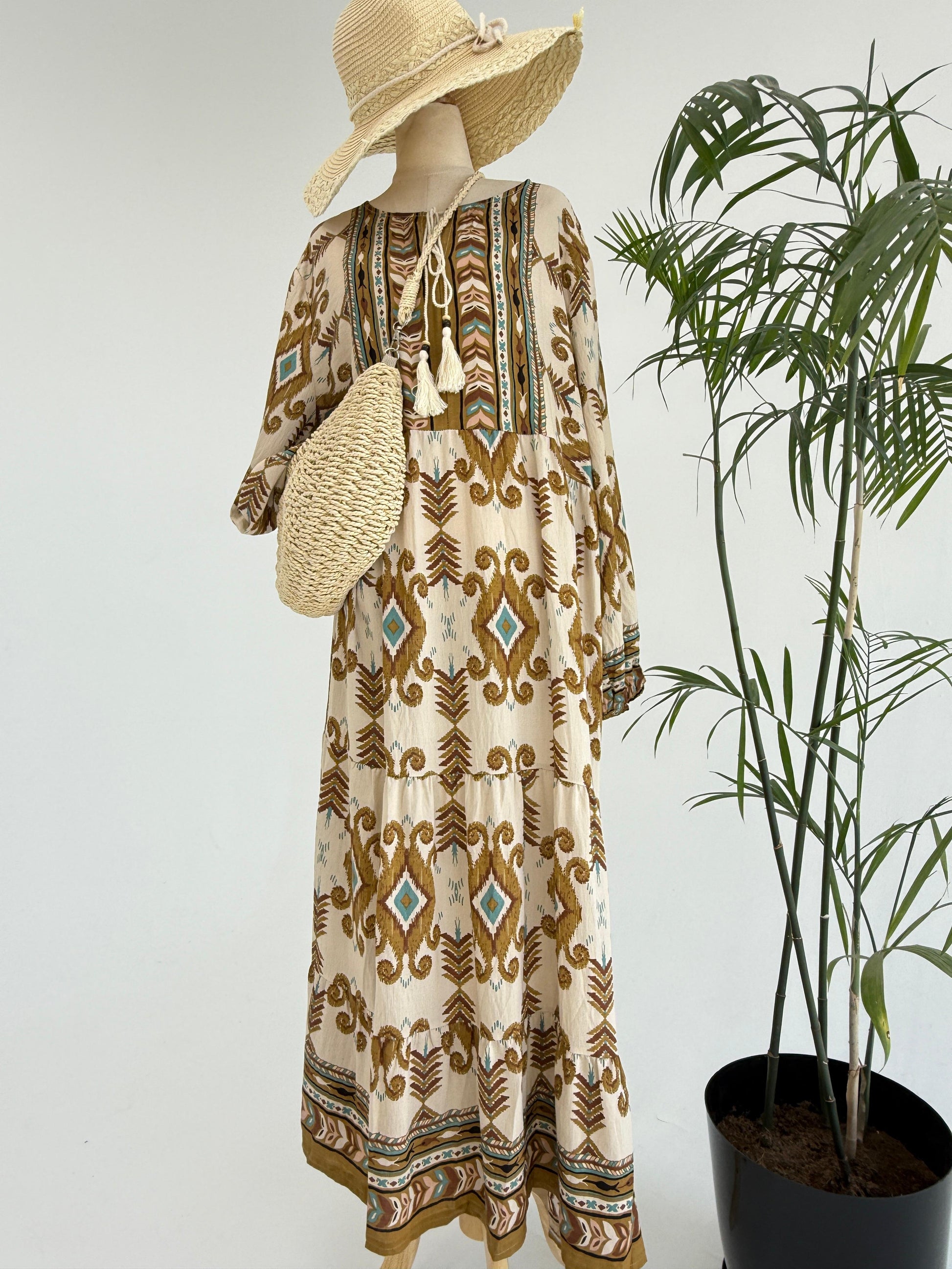 Amenaa boho pattern maxi dress with flowing fabric and vibrant design, perfect for casual summer wear.