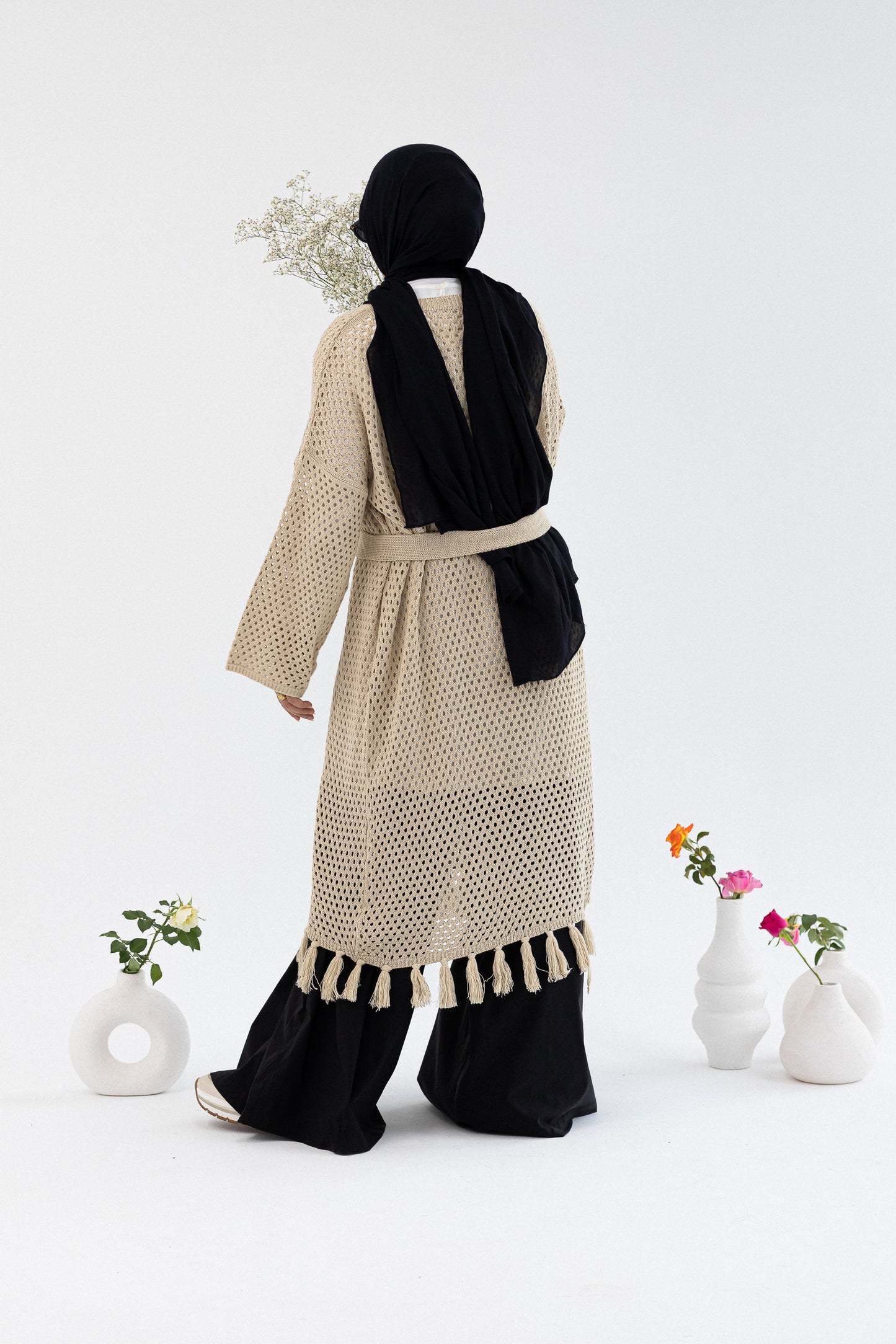 Amenaa crochet knit cardigan in a soft, textured design featuring long sleeves and an open front, perfect for layering.
