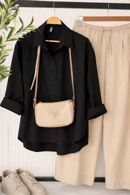 Oversized Amenaa poplin shirt in light fabric, shown in a relaxed fit with a classic collar and button-front design.