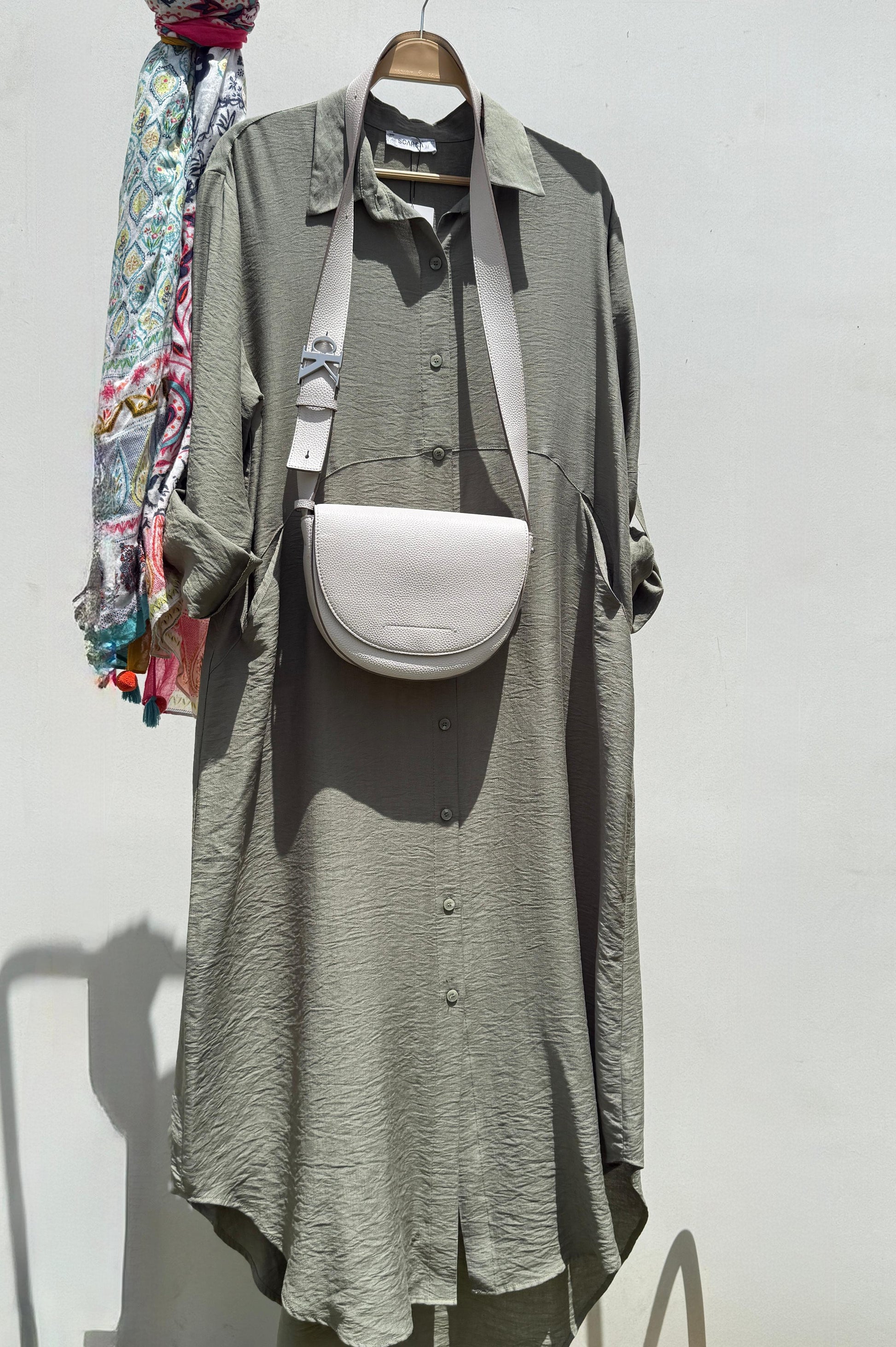 Amenaa shirt dress with a relaxed fit, button-up front, and collar, shown in a casual, lightweight fabric.