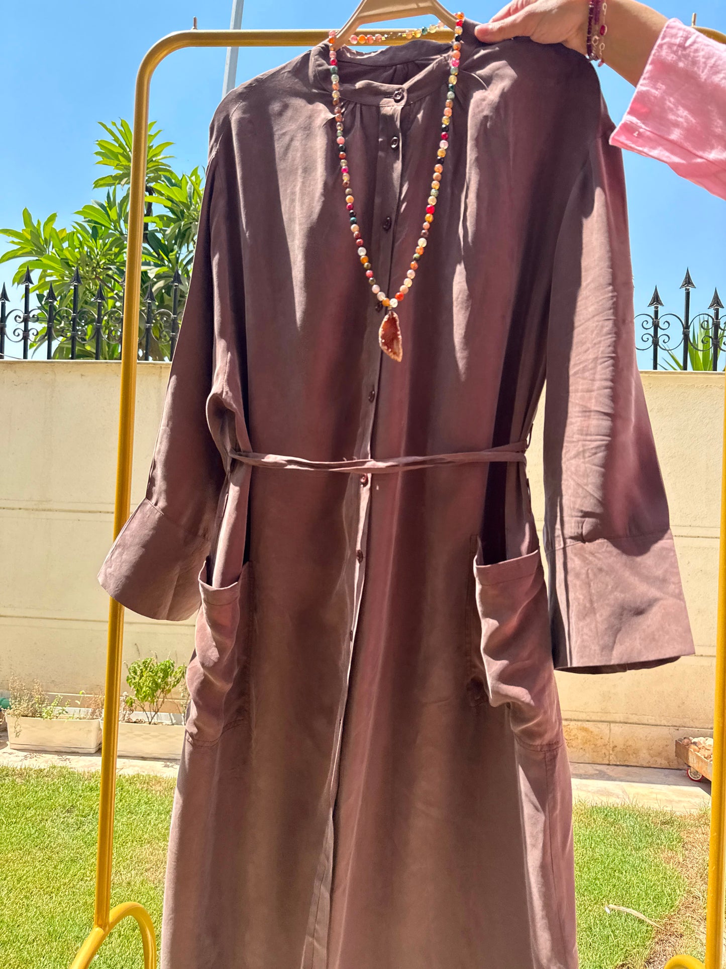 Elegant beige Modest Abaya by Amenaa featuring flowing fabric and subtle embroidery, perfect for modest Islamic fashion.