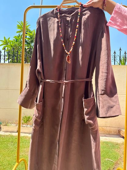 Elegant beige Modest Abaya by Amenaa featuring flowing fabric and subtle embroidery, perfect for modest Islamic fashion.