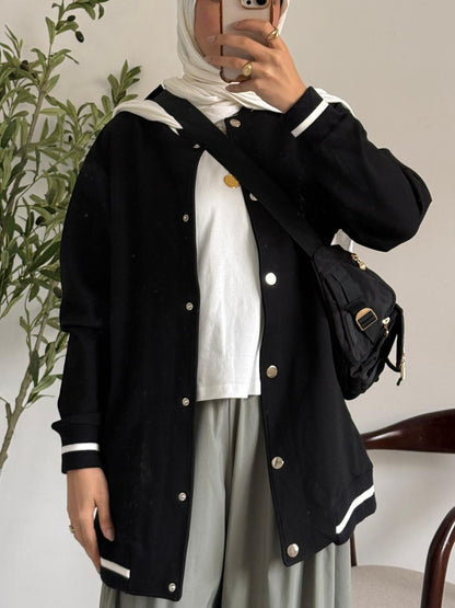 Amenaa Simple Snap Jacket shown in navy, featuring a casual design with snap button closures and a comfortable fit.