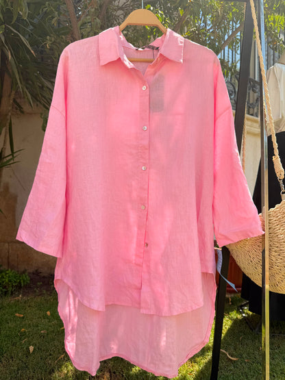 Amenaa linen shirt displayed on a hanger with a relaxed fit and natural fabric texture, perfect for casual and warm weather wear.