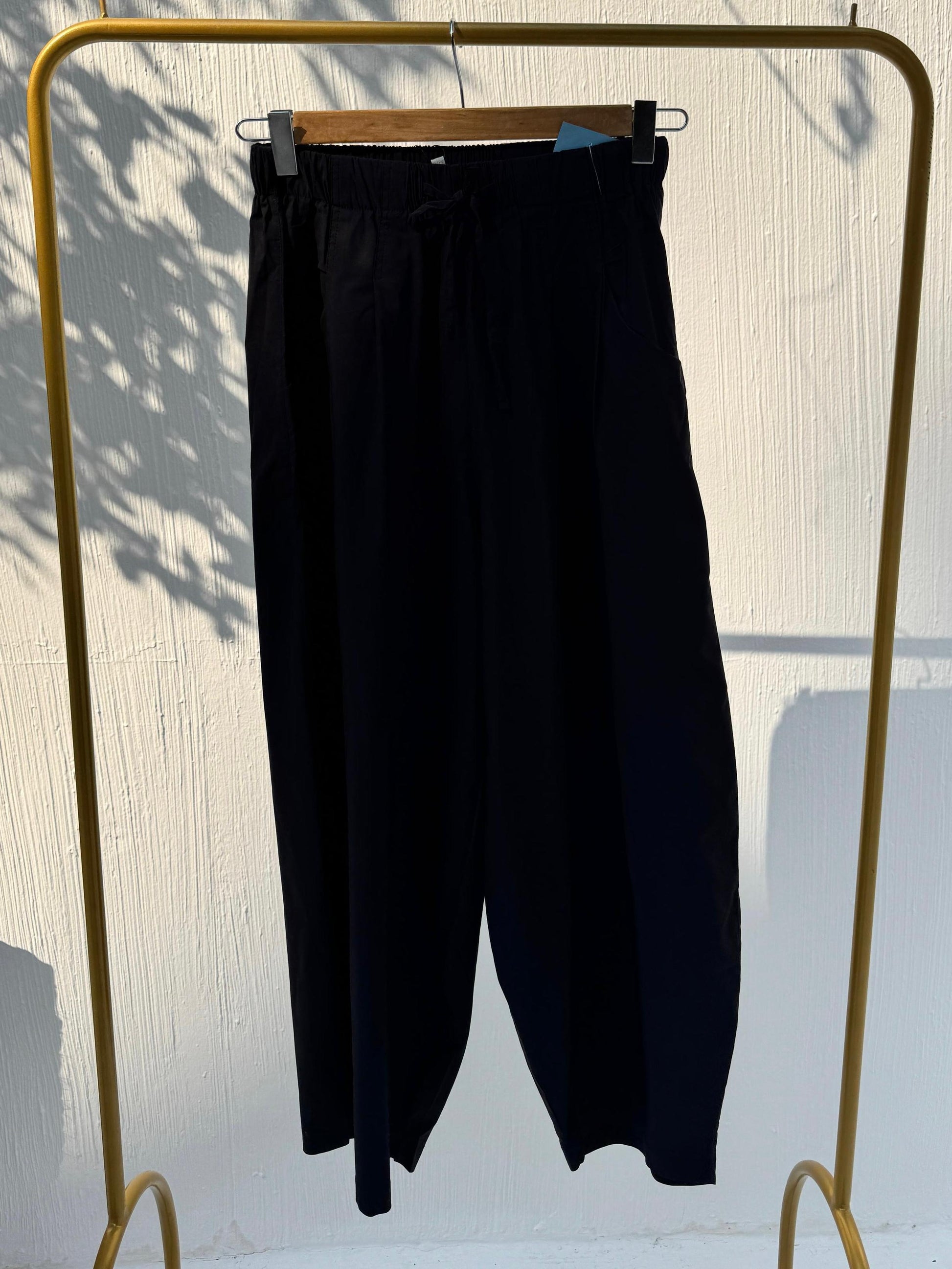 Amenaa balloon pants featuring a loose, oversized fit with a gathered waistband and wide-legged silhouette.