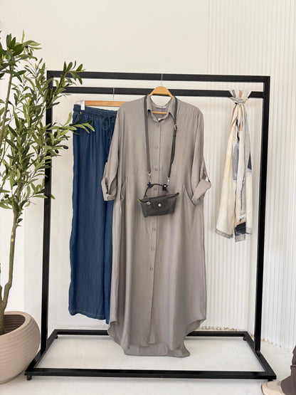 Amenaa shirt dress with a relaxed fit, featuring a button-down front and collar, in a casual, stylish design.