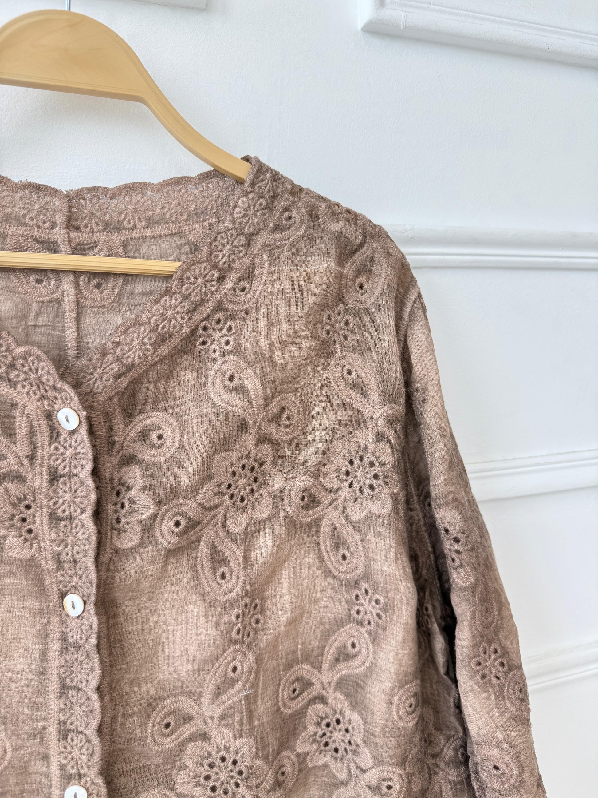 Amenaa Guipure Blouse with intricate lace details, lightweight fabric, and elegant design perfect for stylish occasions.