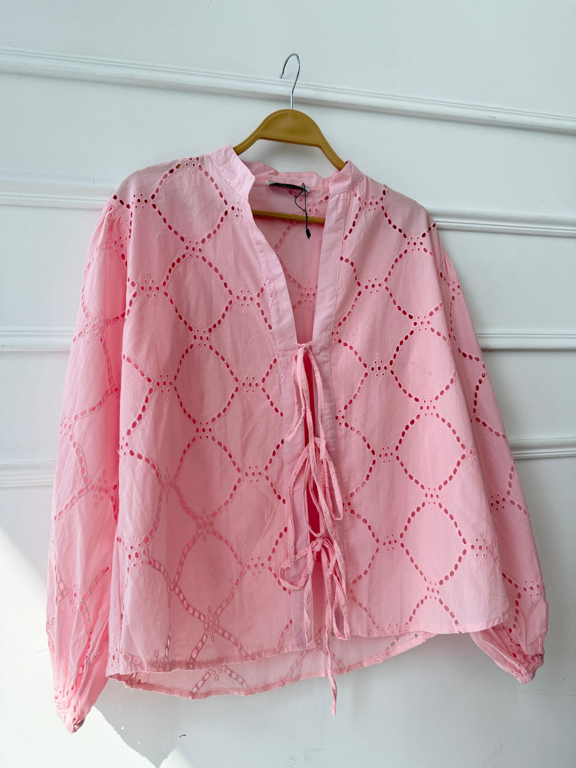 Amenaa Summer Rokama Tie Blouse in light fabric, featuring a stylish tie detail and relaxed fit for warm weather wear.