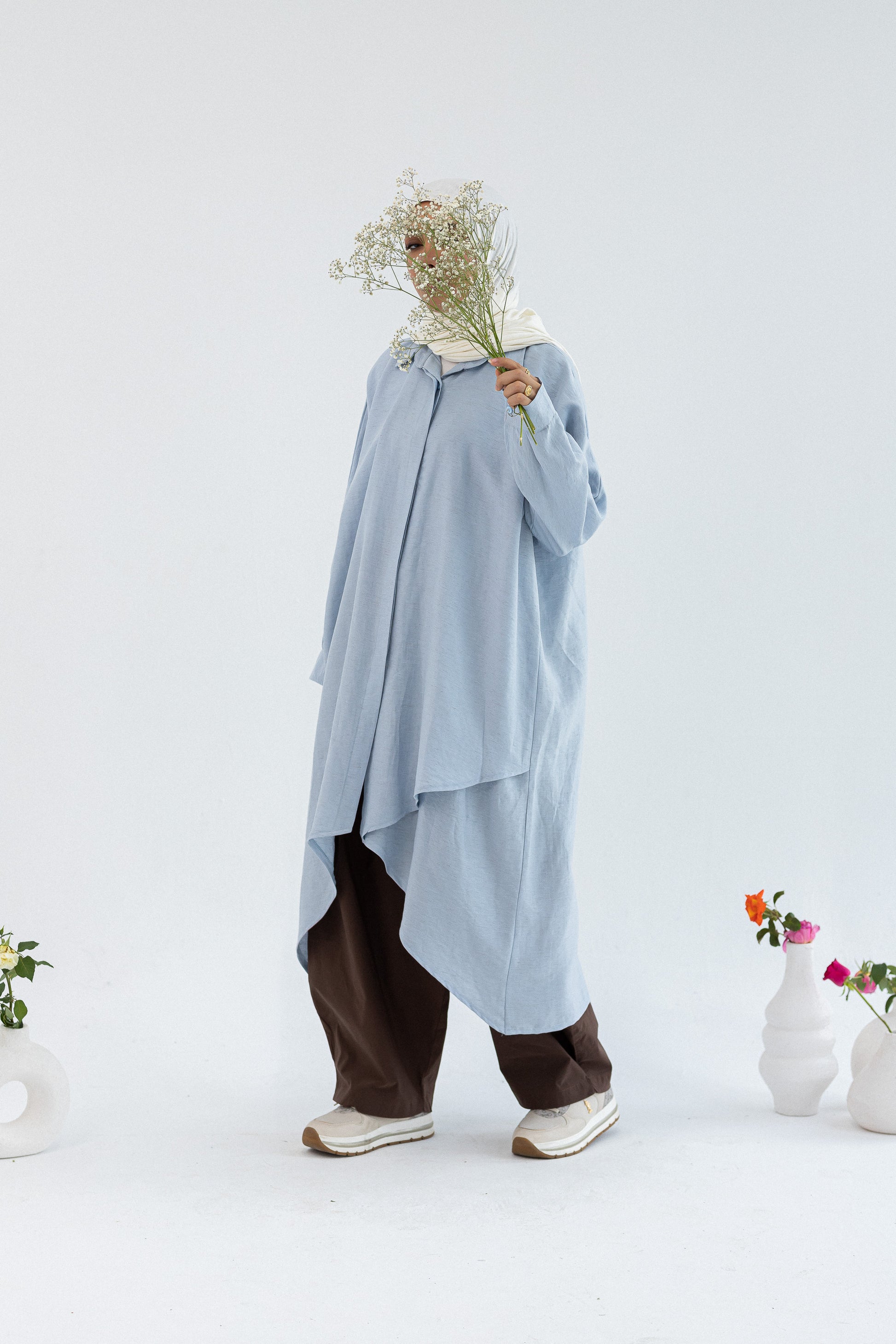 Minimal Flow Tunic by Amenaa, showcasing a lightweight, flowing fabric with a relaxed fit and subtle design details.