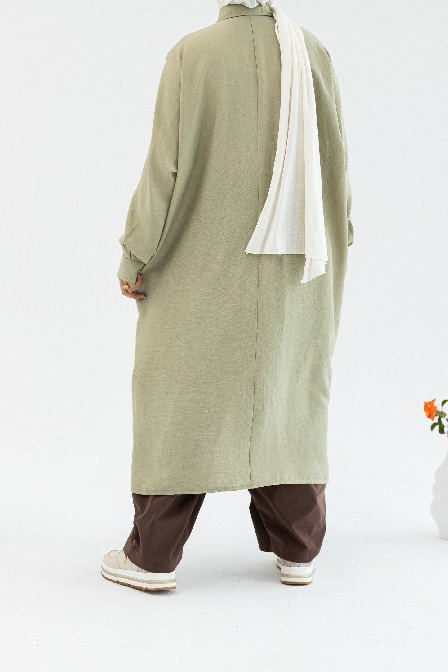 Amenaa Minimal Flow Tunic in soft fabric, featuring a relaxed fit with 27-inch length, 21-inch sleeve, and 2-inch cuff detail.