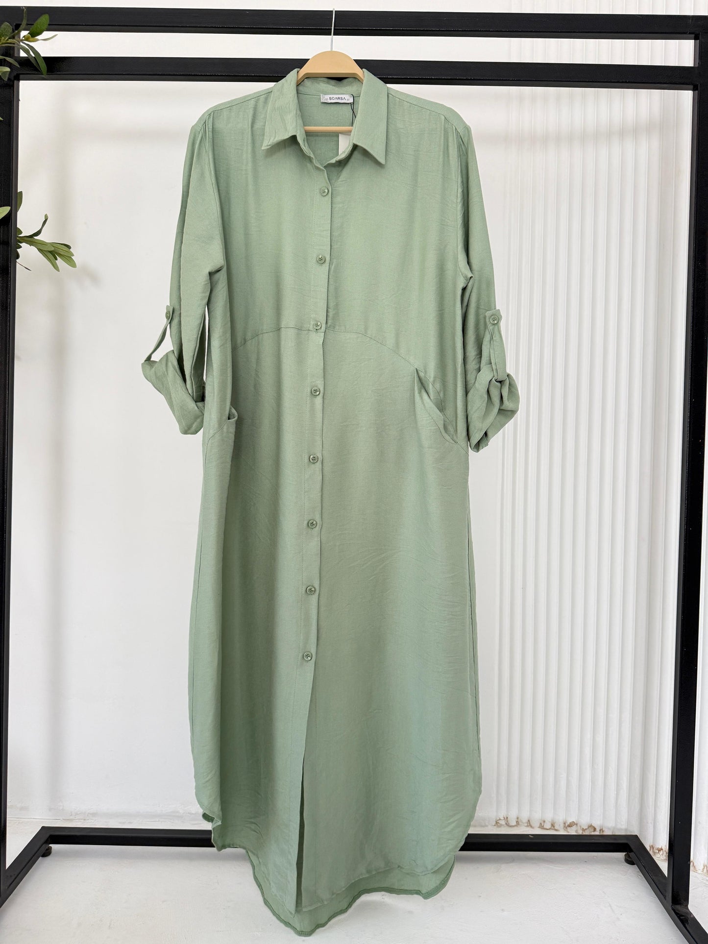 Amenaa shirt dress in soft fabric with a relaxed fit, featuring a collar, button-down front, and short sleeves.