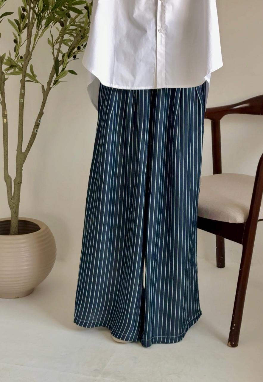 Amenaa wide leg striped pants with a relaxed fit, featuring bold horizontal stripes and a high waist design.