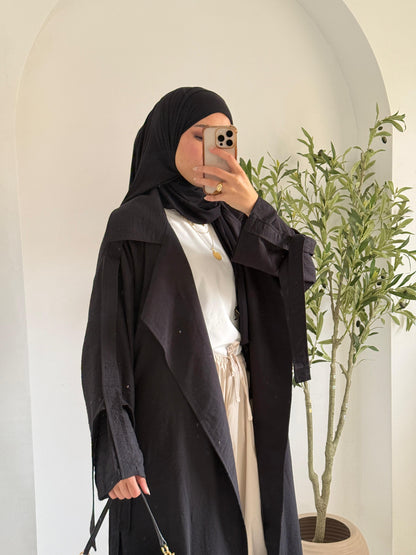 Amenaa summer trench coat in light fabric, beige color, stylish design with collar and button details, perfect for warm weather.