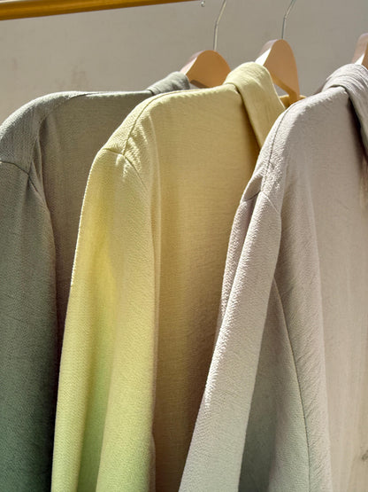 Amenaa shirt dress with long sleeves, button-front, and waist tie, shown in a stylish, casual design perfect for everyday wear.